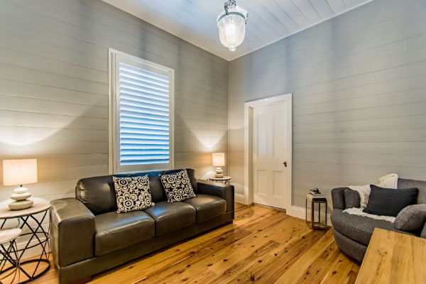 Second living area with heritage shiplap walls